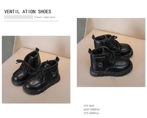 Detail view of glossy black kids Martin boots with side zipper and rugged anti-slip sole