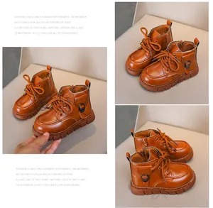 Detailed view of children's caramel boots featuring lace-up design and side zippers