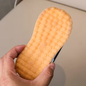 Detail shot of non-slip rubber sole with texture and size markings for kids shoes