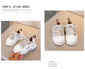 Macro view of breathable mesh panel and neutral textured stitching on children sneakers