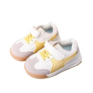 Classic kids low-top sneakers in white and yellow with durable gum sole for boys and girls