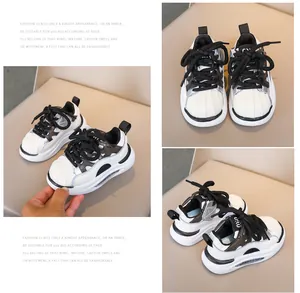 Detailed macro view of children's white sneakers with thick soft soles and shell-toe design