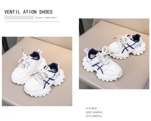 Detail of kids sneakers showing breathable mesh upper and KE SPORTS laces in white and blue