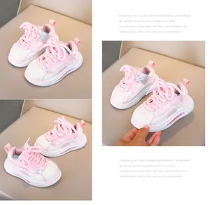 Detailed views of pink and white toddler sneakers with shell toe and rubber sole