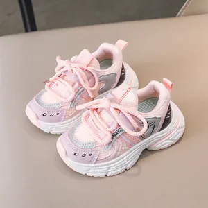 Pink and grey kids sports sneakers with durable synthetic leather and non-slip sole
