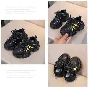 Detailed close-up of children's retro sneakers featuring breathable mesh and non-slip soles