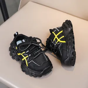 Detail view of anti-slip thick rubber sole on breathable kids sports sneakers