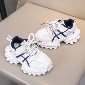 Detail view of children's sneakers with breathable mesh panels and thick anti-slip soles
