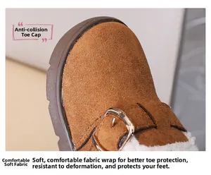 Detail of reinforced toe cap on brown suede winter shoes with warm lamb wool lining
