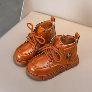 Brown leather children's martin boots with thick rubber soles and side zipper