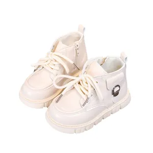 Cream children's Martin boots with matte leather, thick rubber soles and side zippers