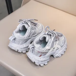 Close-up of silver-gray chunky toddler sneaker with breathable mesh and anti-slip sole