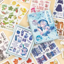 Detail of vintage plant PET stickers in a light blue gift box with aesthetic gold stamping