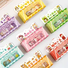 Macro view of assorted washi tape set in colorful packaging for DIY scrapbooking