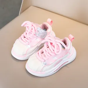 Pink and white toddler sneakers with soft sole and decorative shell toe for kids
