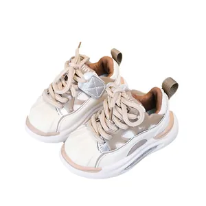 Kids casual sneakers in cream and brown with soft soles and air cushion heels