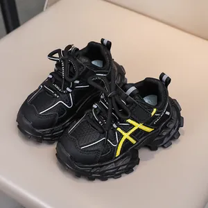Kids black and yellow breathable sports shoes with thick non-slip soles for active wear