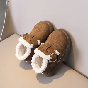 Kids warm winter snow boots in brown suede with thick white faux shearling lining