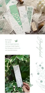 Detail van vintage lelie van dalen bladwijzers met vlindermotieven en reliëfpapier