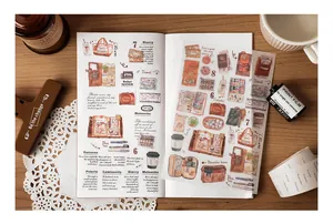 Detail shot of vintage aesthetic washi stickers with coffee and starry sky patterns