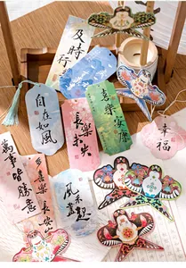 Detail of traditional Chinese bookmarks with silk tassels and ink wash painting designs