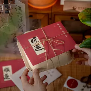Artistic hollowed blessing card set with red envelope and Chinese calligraphy text