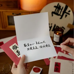 Chinese calligraphy greeting card set with red envelope and textured paper for blessing