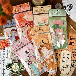 Chinese style bookmarks with tassels featuring goldfish and flower hand-drawn illustrations