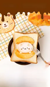 Close-up of cute cartoon bread-themed postcards with bear and cat bakery illustrations