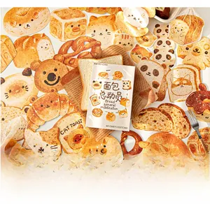 Flat lay of cute bread-shaped postcards featuring cartoon animal illustrations and pastries