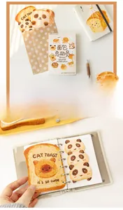 Detail of MO-CARD cute animal bread postcards inside a binder with creative gift packaging