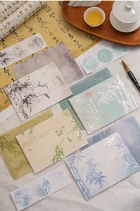 Detail of Chinese style greeting cards with bamboo motifs and silver foil stamping