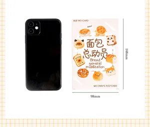 Cartoon bread animal postcards next to a smartphone showing dimensions of 148mm by 98mm