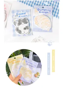 Close-up of cute cat shaped sticky notes for scrapbooking and creative journaling