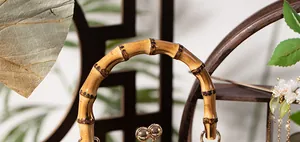 Detail of handcrafted bamboo handle with golden metal buckle for vintage DIY bags