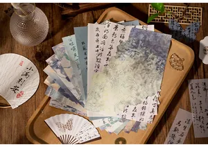 Macro detail of retro Chinese calligraphy material paper with traditional ink painting patterns