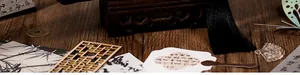Macro view of Chinese retro DIY bag kit with tassels, wooden charms and calligraphy cards