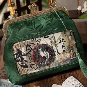 DIY Chinese style silk ita bag with dark green silk, bamboo handle and gold tassel decoration