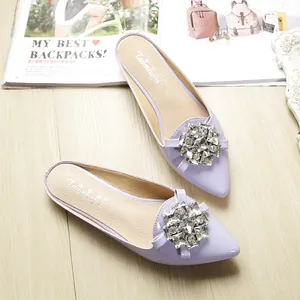 Light purple pointed toe mules with large crystal square buckle and glossy finish