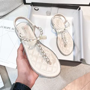Women's T-Strap Flat Sandals With Faux Pearl Rhinestone Bow Microfiber Upper Quilted Insole Elastic Back Strap Summer Shoes