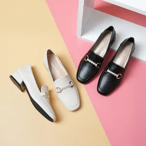 Women's loafers in black and beige leather with pearl metal buckle and low chunky heel