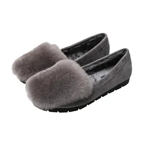 Women's grey faux fur lined flat loafers with plush fur trim for autumn and winter warmth