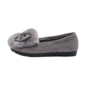 Women's grey faux fur lined platform loafers with bow and metal chain detail