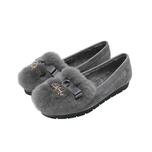 Mocasines de invierno para mujer en gris con ribete de piel sintética y lazo elegante