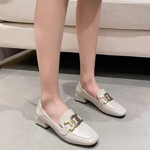 British style cream leather loafers with square toe and gold chain buckle detail