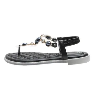 Damen Zehentrenner Sandalen in Schwarz mit transparentem PVC und blauen Edelsteinen