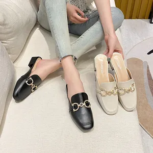 Women's square toe mule sandals with rhinestone horsebit buckle in black and beige