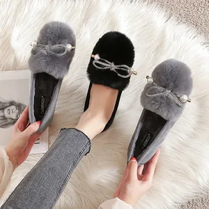 Winter faux fur loafer shoes with pearl bow decoration in black and grey colors