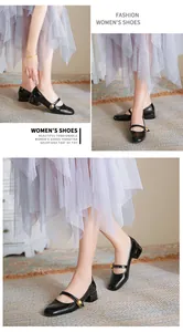 Close-up of black patent leather Mary Jane shoes with elegant gold button details