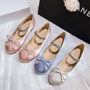 Elegant satin Mary Jane flats with rhinestone straps and bows in four soft colors